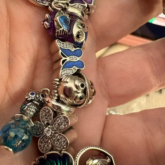 Linx bracelet with owl and butterfly charms